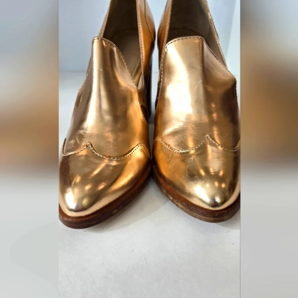 The office of Angela Scot Elegant Rose Gold Metallic Heels